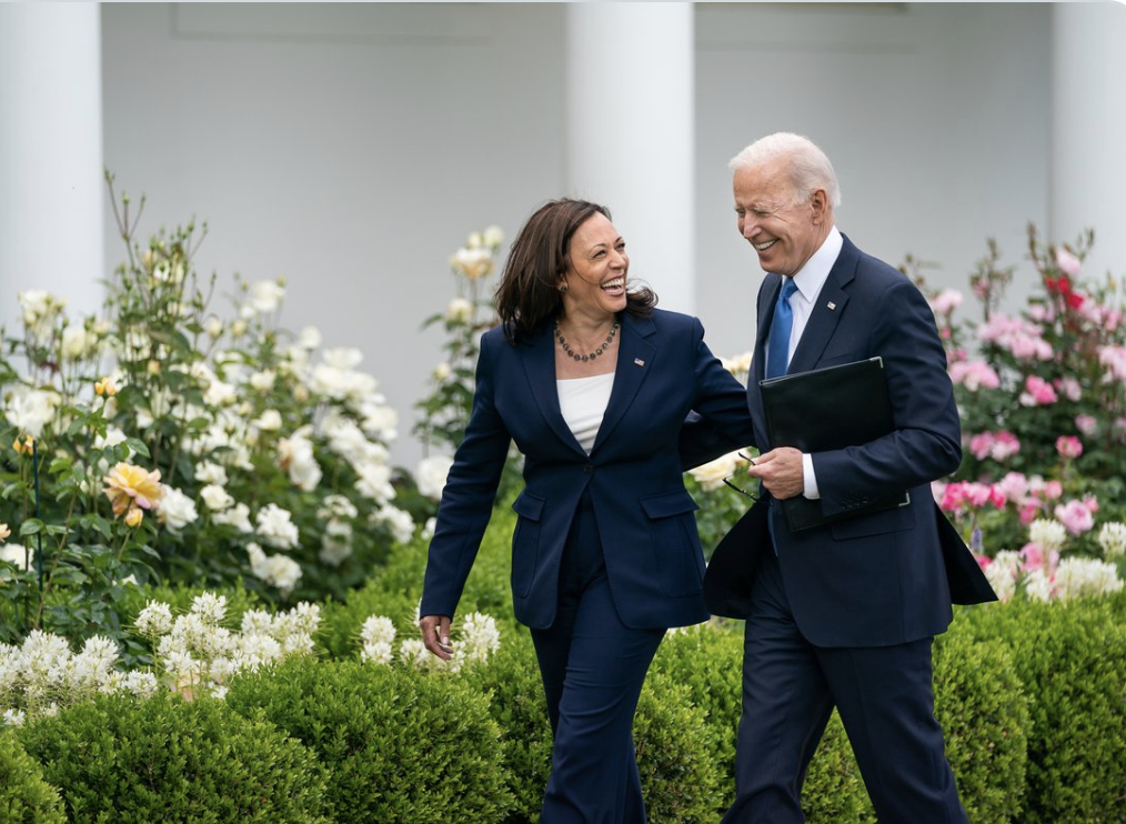 Kamala Harris and Joe Biden walking at White House